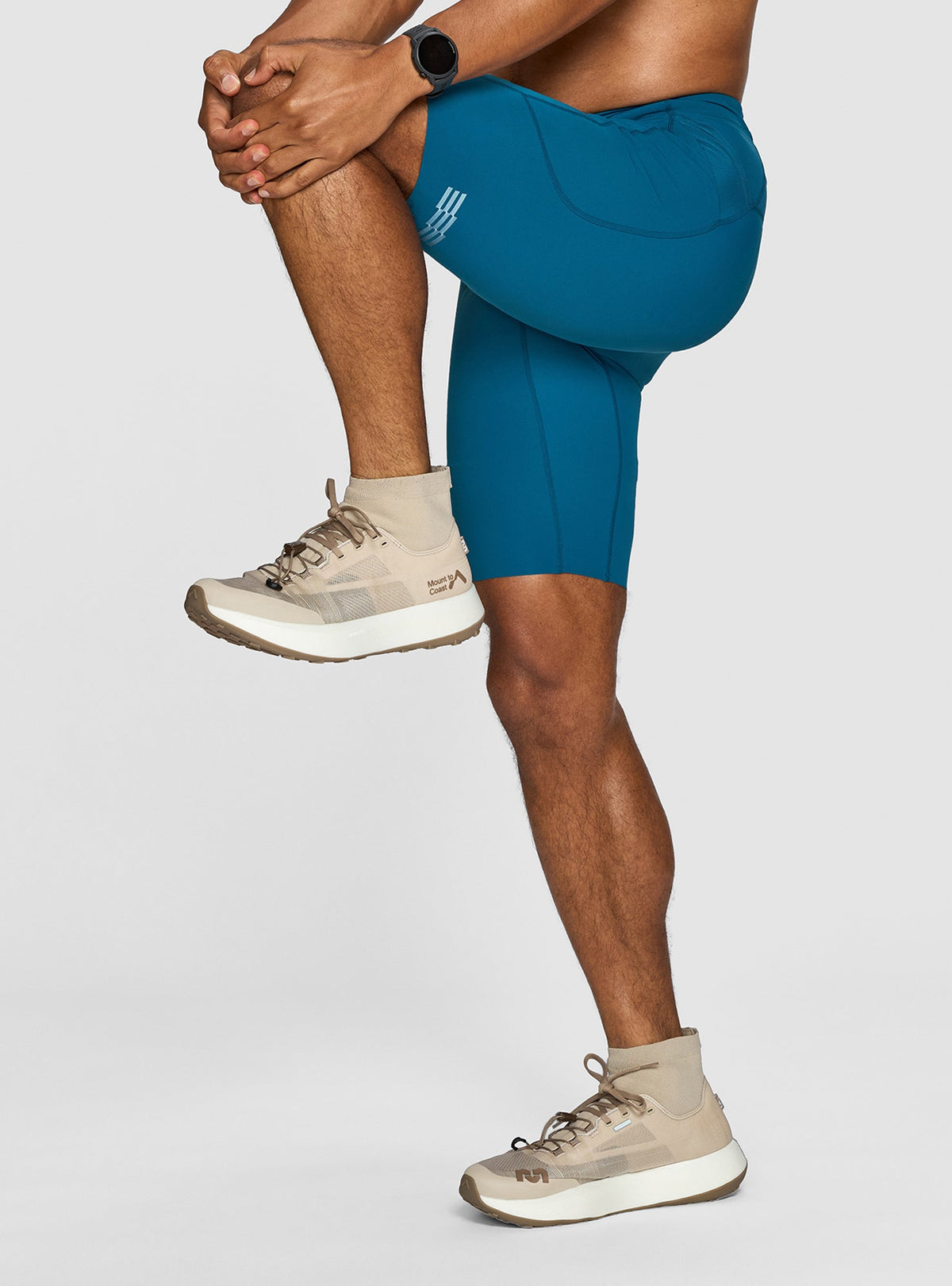 Men's - Janji 8" Trail Half Tight - Tidal